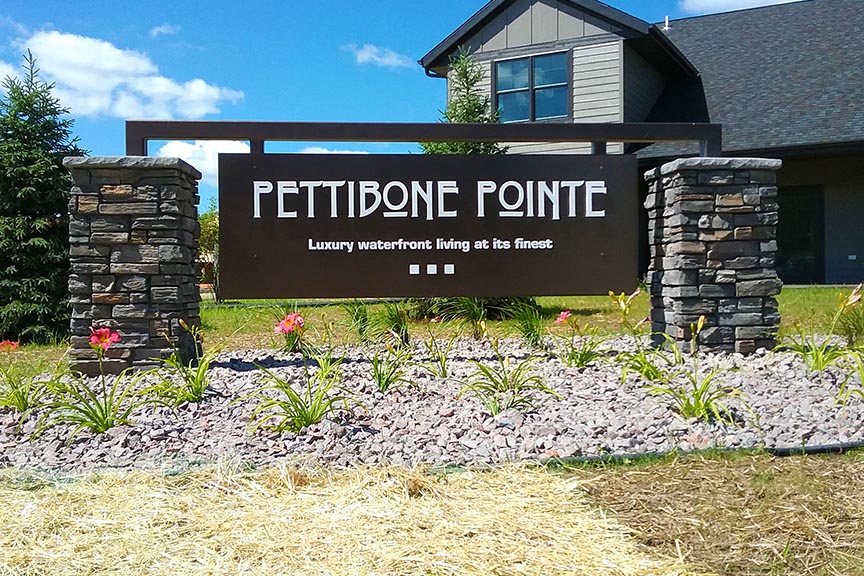 View of the Pettibone Pointe Sign in La Crosse, WI which emphasizes the opportunity for signage to build your brand identity.